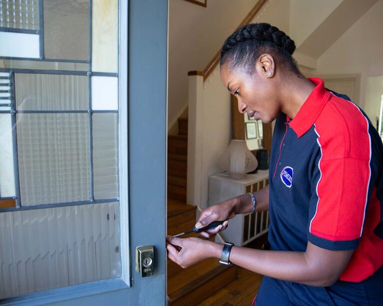 Pimlico carpenter installing a door